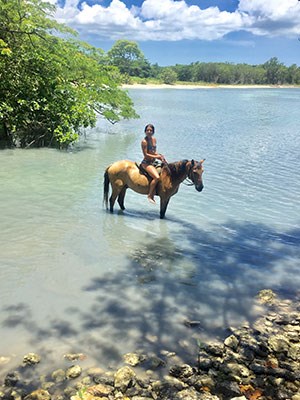 Horse riding in blue lagoon